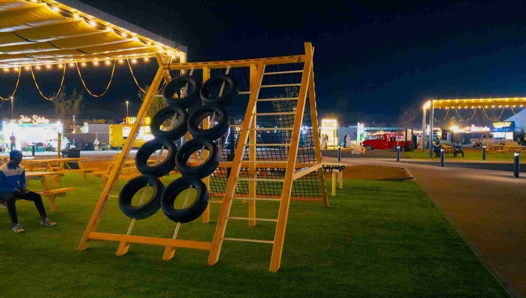 Inclusive playground in Liwa featuring accessible play equipment designed to foster physical activity and social interaction among children and families